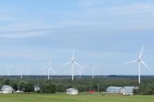 wind turbines fields house barn structures