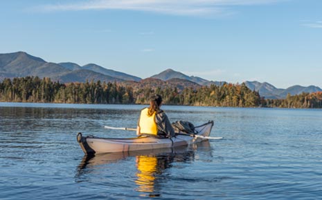 Adrirondack Mountains Woman Kyaking